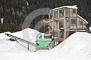 Abandoned construction site at winter. Santa Caterina in Valfurva