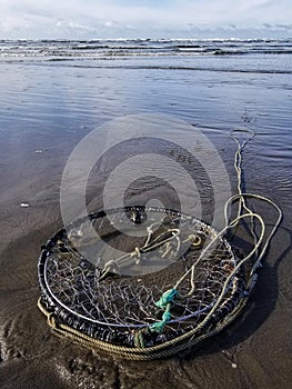 Abandoned crab trap washed ashore