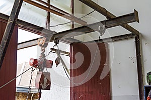 Abandoned crane with pulley