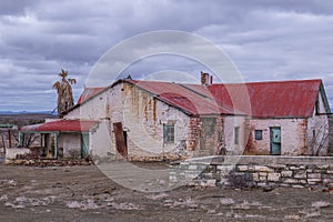 Abandoned desolate old farmhouse - concept fail photo