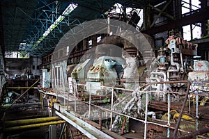 Abandoned, destroyed by war and overgrown machinery of Tkvarcheli power plant