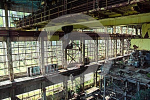 Abandoned, destroyed by war and overgrown machinery of Tkvarcheli power plant