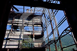 Abandoned, destroyed by war and overgrown machinery of Tkvarcheli power plant