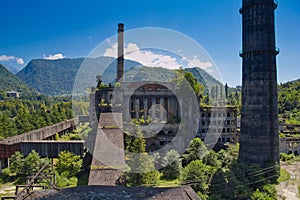 Abandoned, destroyed by war and overgrown Tkvarcheli power plant, Abkhazia, Geor