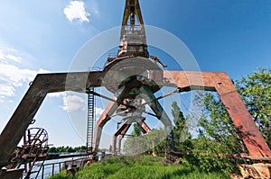 Abandoned dock cranes in Prypiat, Chernobyl exclusion Zone. Chernobyl Nuclear Power Plant Zone of Alienation in Ukraine