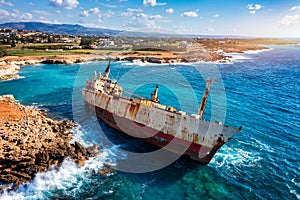 Abandoned Edro III Shipwreck at seashore of Peyia, near Paphos, Cyprus. Historic Edro III Shipwreck site on the shore of the water