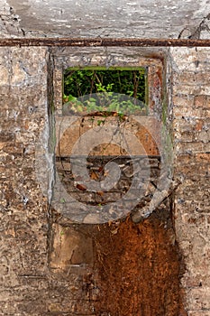 Abandoned empty old dark underground cellar. An abandoned basemen