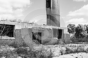 Abandoned Factory with Brick Smokestack and the Remnants of the Power Plant II