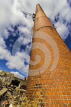 Abandoned Factory with Brick Smokestack and the Remnants of the Power Plant IV