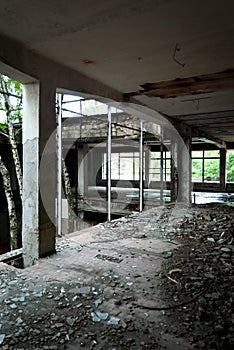 Abandoned factory building from the inside, the ruins of the wall