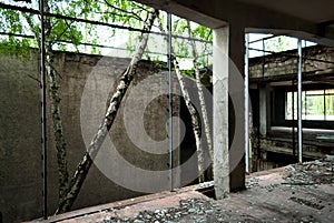 Abandoned factory building from the inside, the ruins of the wall