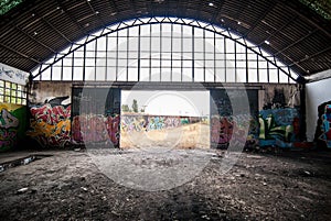 Abandoned factory, destroyed with graffiti on the walls