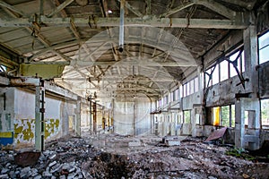 Abandoned factory. Large empty ruined industrial hall