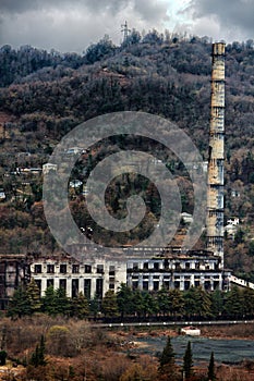 Abandoned factory in mountains.