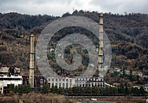 Abandoned factory in mountains.