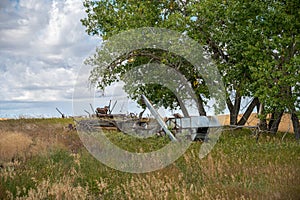 Abandoned farm equipment in field