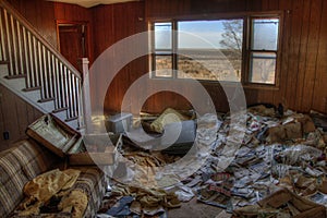 An Abandoned Farm House in Rural South Dakota Agricultural Country loses against to the Elements