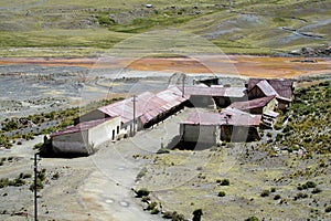 Abandoned farm houses in mountain valley