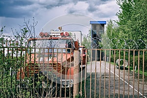 Abandoned fire truck and tower in the old fire station