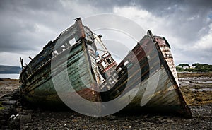Abandoned fishing boats on Mull, Scotland. photo