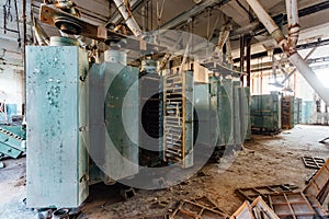 Abandoned flour milling factory. Old rusty grain cleaning air separation machines