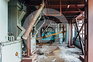 Abandoned flour milling factory. Old rusty grain cleaning air separation machines