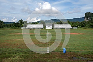 Abandoned football stadium and field with nobody