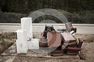 Abandoned furniture and fridges in the street and forest