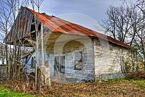 Abandoned Gas Station with Rusted Tin Roof