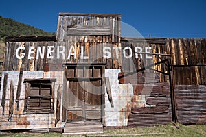 Abandoned General Store building, falling apart, in the ghost town of Mogollon New Mexico