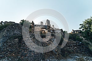 The abandoned Greek village of Kayakoy, Fethiye, Turkey. Ghost Town Kayakoy. Turkey, evening sun. Ancient abandoned