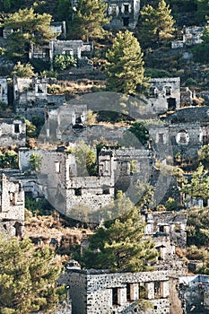 The abandoned Greek village of Kayakoy, Fethiye, Turkey. Ghost Town Kayakoy. Turkey, evening sun. Ancient abandoned