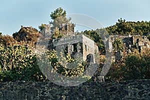 The abandoned Greek village of Kayakoy, Fethiye, Turkey. Ghost Town Kayakoy. Turkey, evening sun. Ancient abandoned