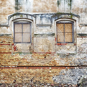 Abandoned grunge cracked stucco wall