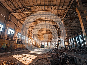 Abandoned and haunted industrial creepy warehouse inside, old ruined grunge factory building