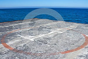 Abandoned helipad over the sea