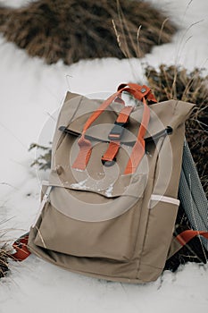 Abandoned Hiker's Backpack Covered in Fresh Snowfall