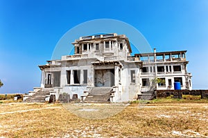 Abandoned hotel Bokor Palace in Ghost town Hill station near Kampot. Cambodia
