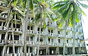 Abandoned hotel in coastal recreation area in Southeast Asia