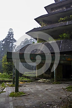 Abandoned hotel on a foggy day