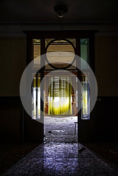 Abandoned hotel hall viewed from the entry