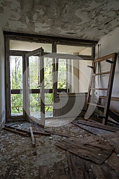 an abandoned hotel room after a raid by vandals