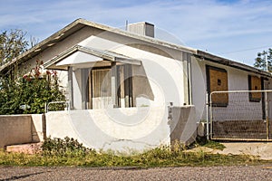 Abandoned House With Boarded Up Windows