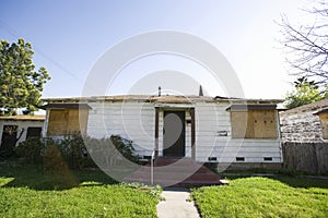 Abandoned House With Boarded Up Windows