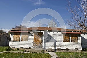 Abandoned House With Boarded Up Windows
