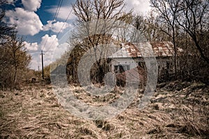 Abandoned house in destroyed village of Kopachi Chernobyl zone, Ukraine