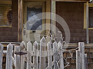 Abandoned house gate and front door