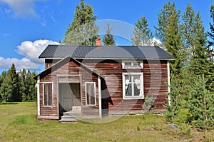 Abandoned house at gravel road