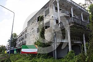 Abandoned house and old commercial building beside Ban Phe road in Rayong, Thailand