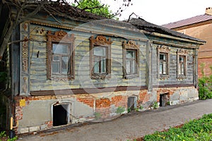 Abandoned house with old wooden window